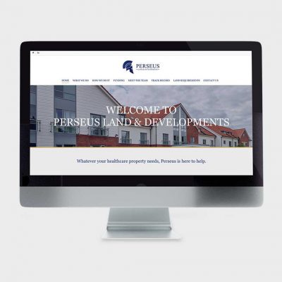 Mac computer showing housing website Mac computer showing housing website